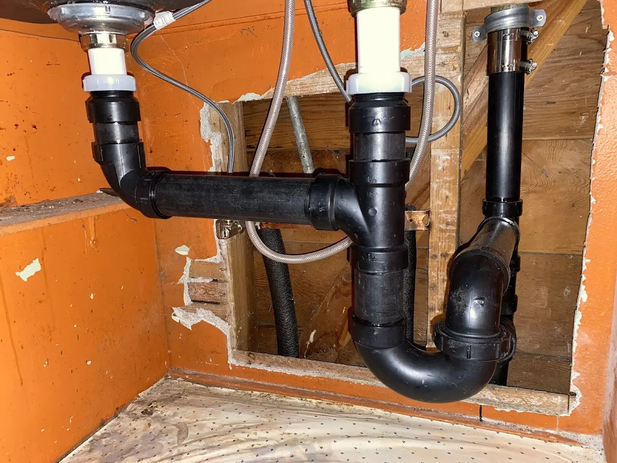 Professional Garbage Disposal Repair equipment and tools on the job in Hudson